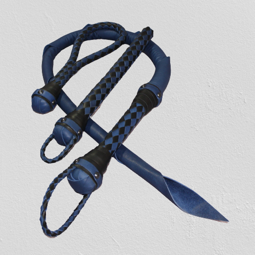 Leather impact toy kit by Agreeable Agony, featuring custom-designed matching leather tools on a neutral background.