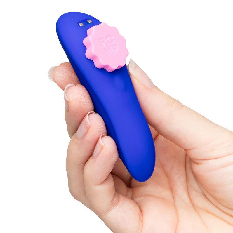 ROMP Party Panty Vibrator by Adult Toy Box displayed in pink with textured surface and compact design suitable for discreet use.