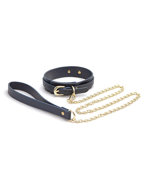 Blue vinyl collar with leash from Bondage Couture, designed for BDSM restraints, featuring a sleek and secure fit.