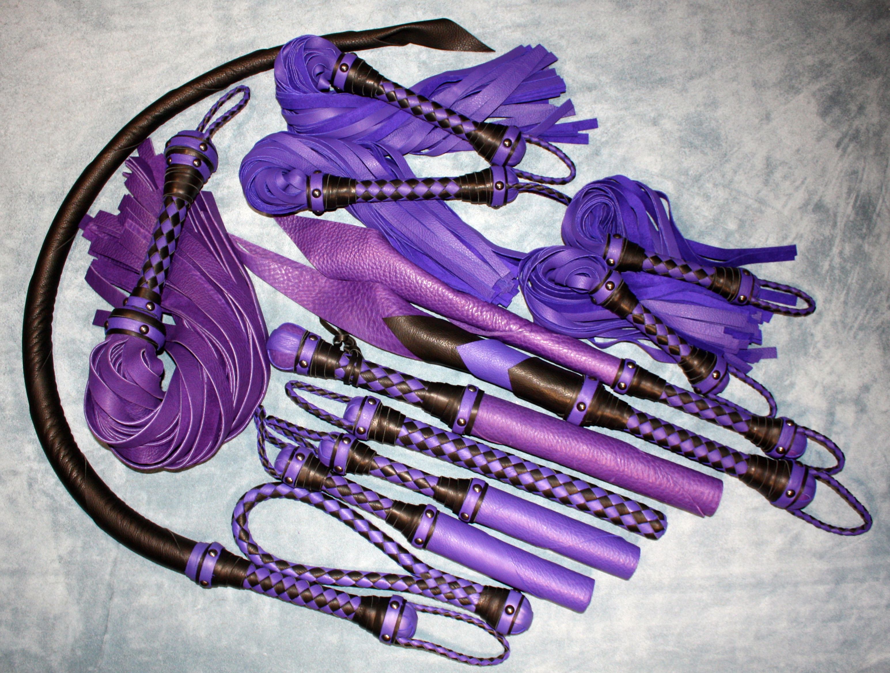 Agreeable Agony coordinated leather impact toy kit, custom-made set with leather straps and tools for impact play activities.
