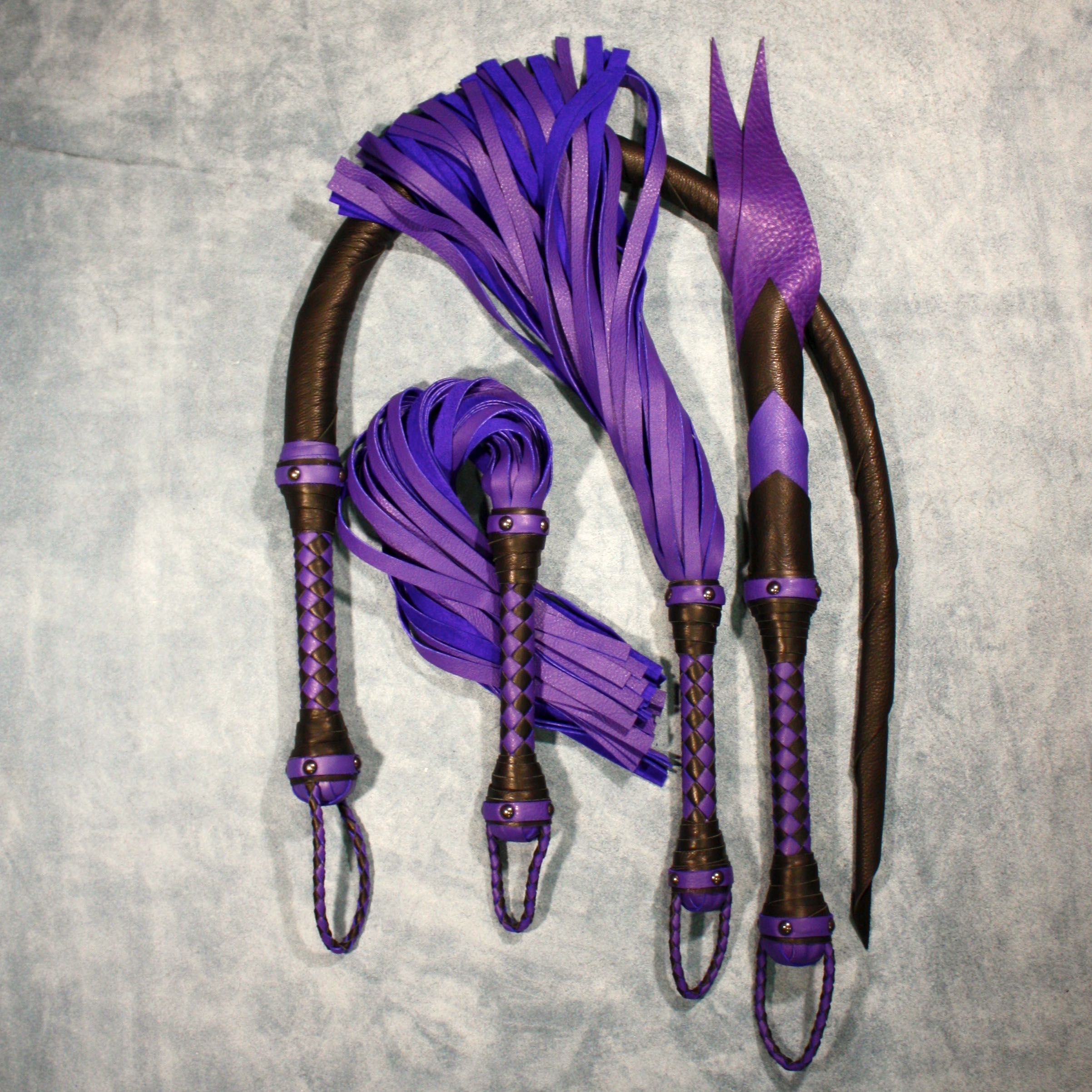 Agreeable Agony leather impact toy kit featuring coordinated, custom-made leather tools for sensory play and BDSM activities.