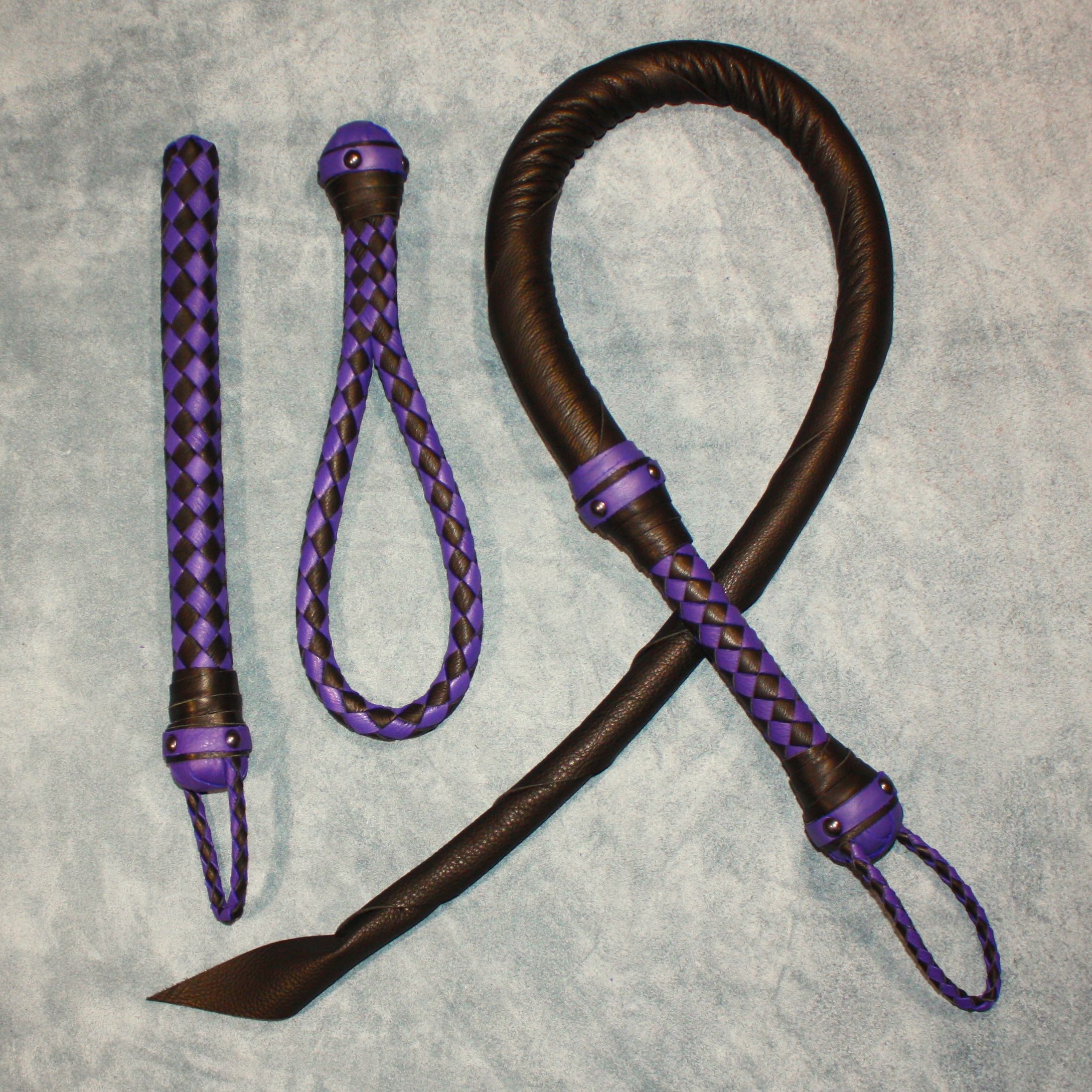 Custom leather impact toy kit by Agreeable Agony, featuring matching, handcrafted leather tools for impact play.