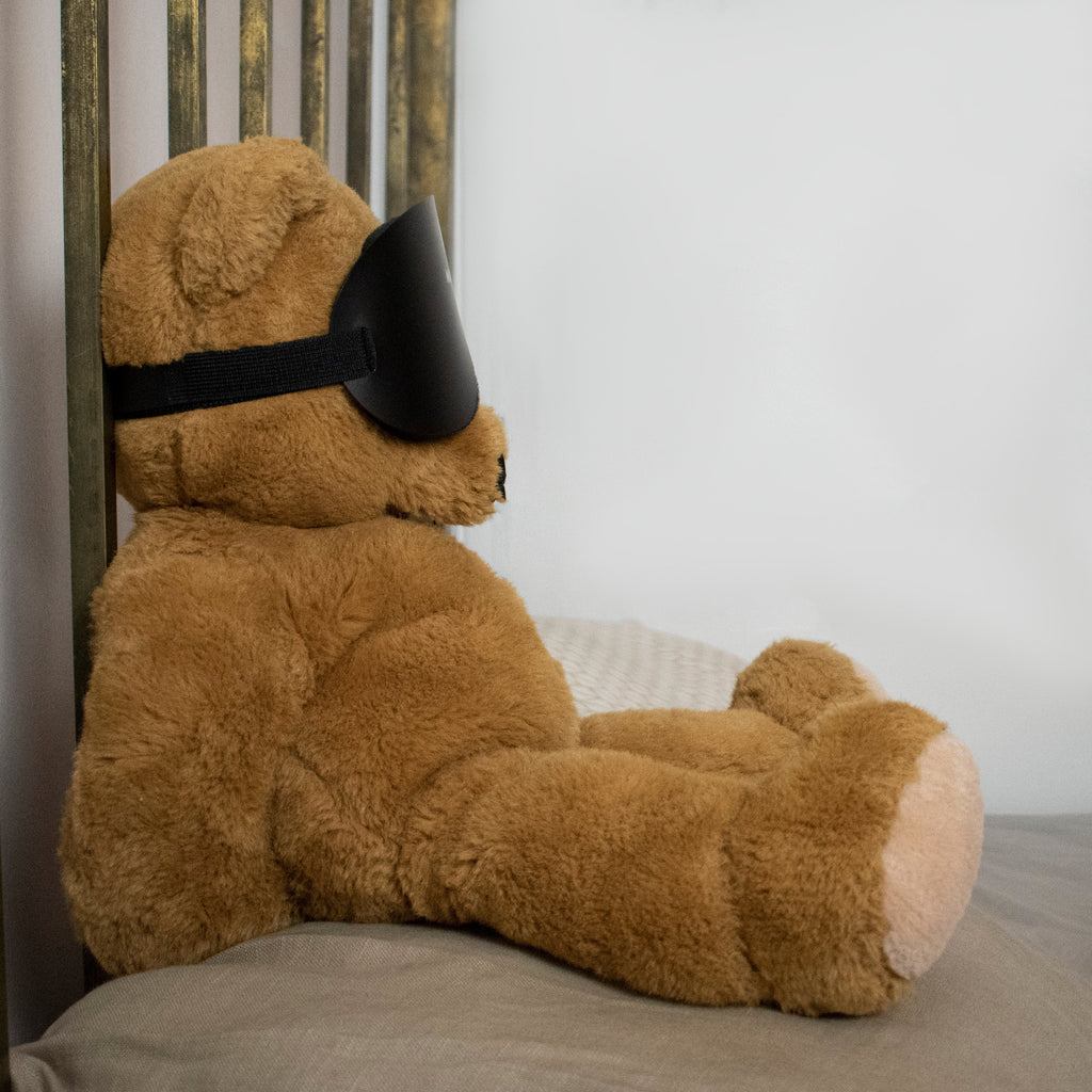 Black Mindfold sensory deprivation mask by Agreeable Agony, designed for kink and sensory play, shown on a person.