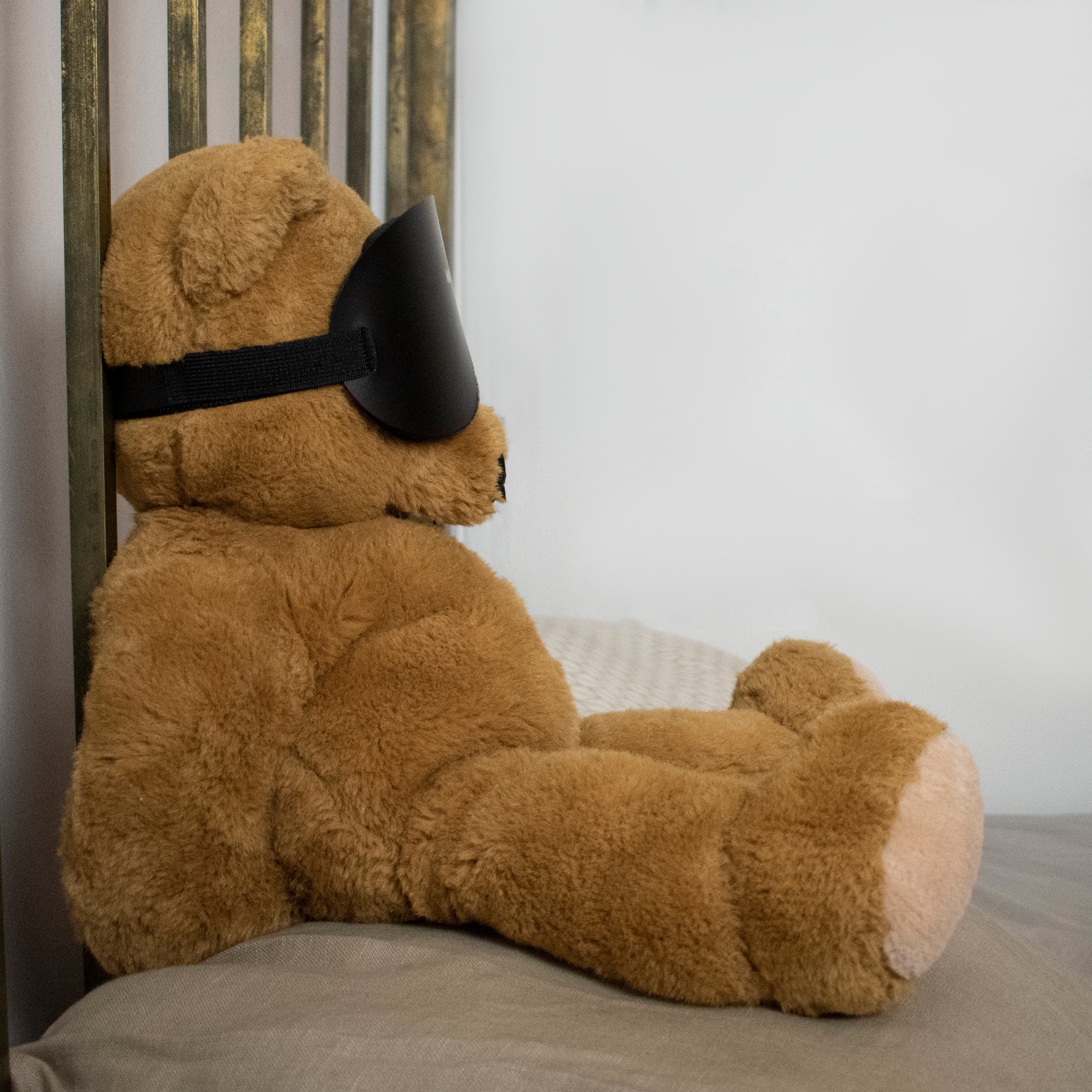 Black Mindfold sensory deprivation mask by Agreeable Agony, designed for kink and sensory play, shown on a person.