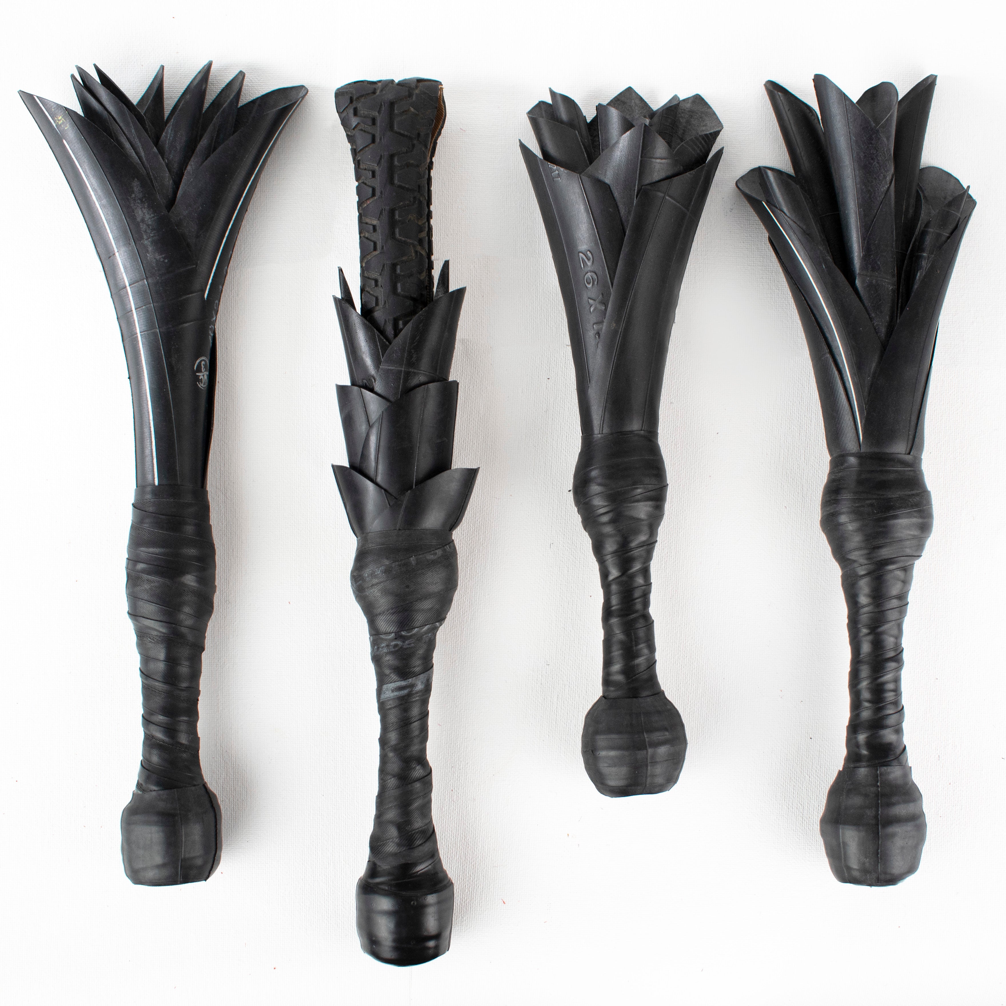 Agreeable Agony Petal Slapper rubber paddle with floral design, in stock leather handle, ideal for sensory play or adult activities.