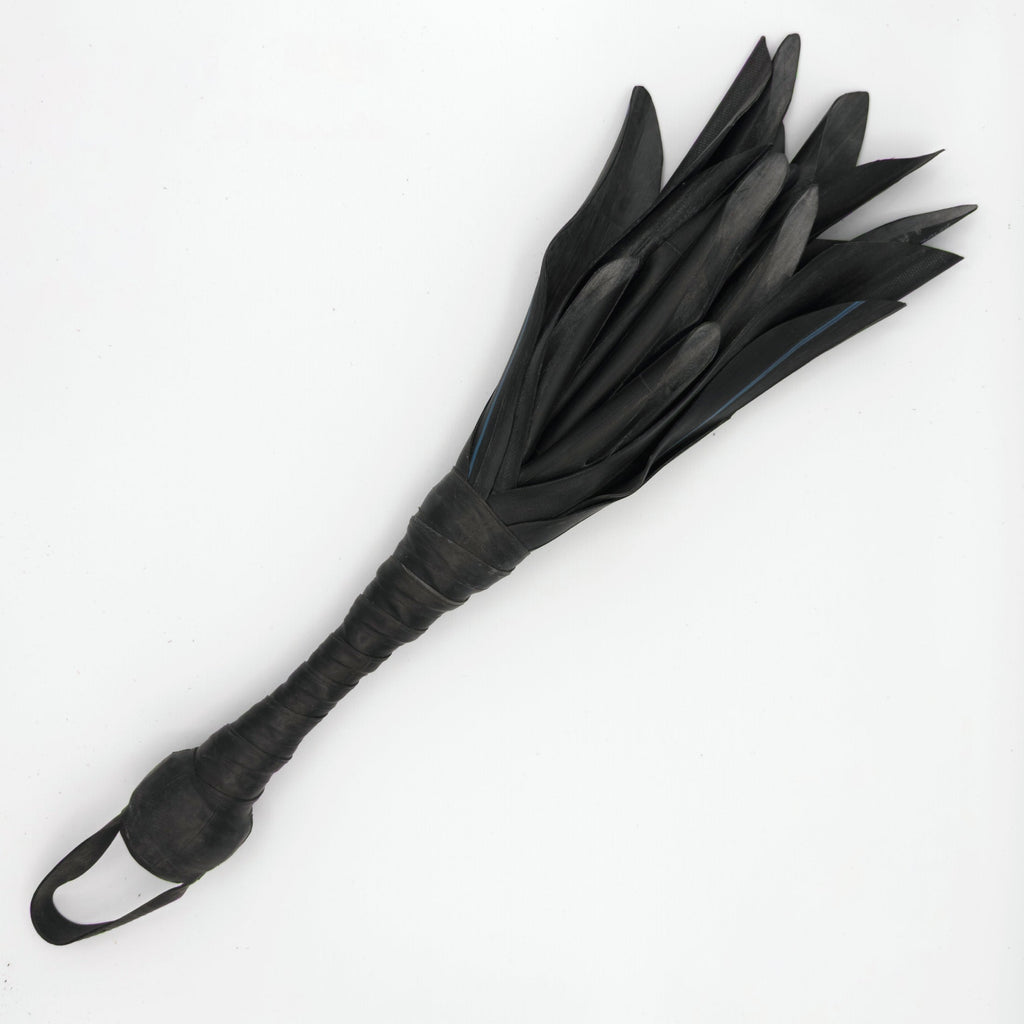 Agreeable Agony Petal Slapper rubber paddle with floral design, medium size leather flower slapper for sensory play.