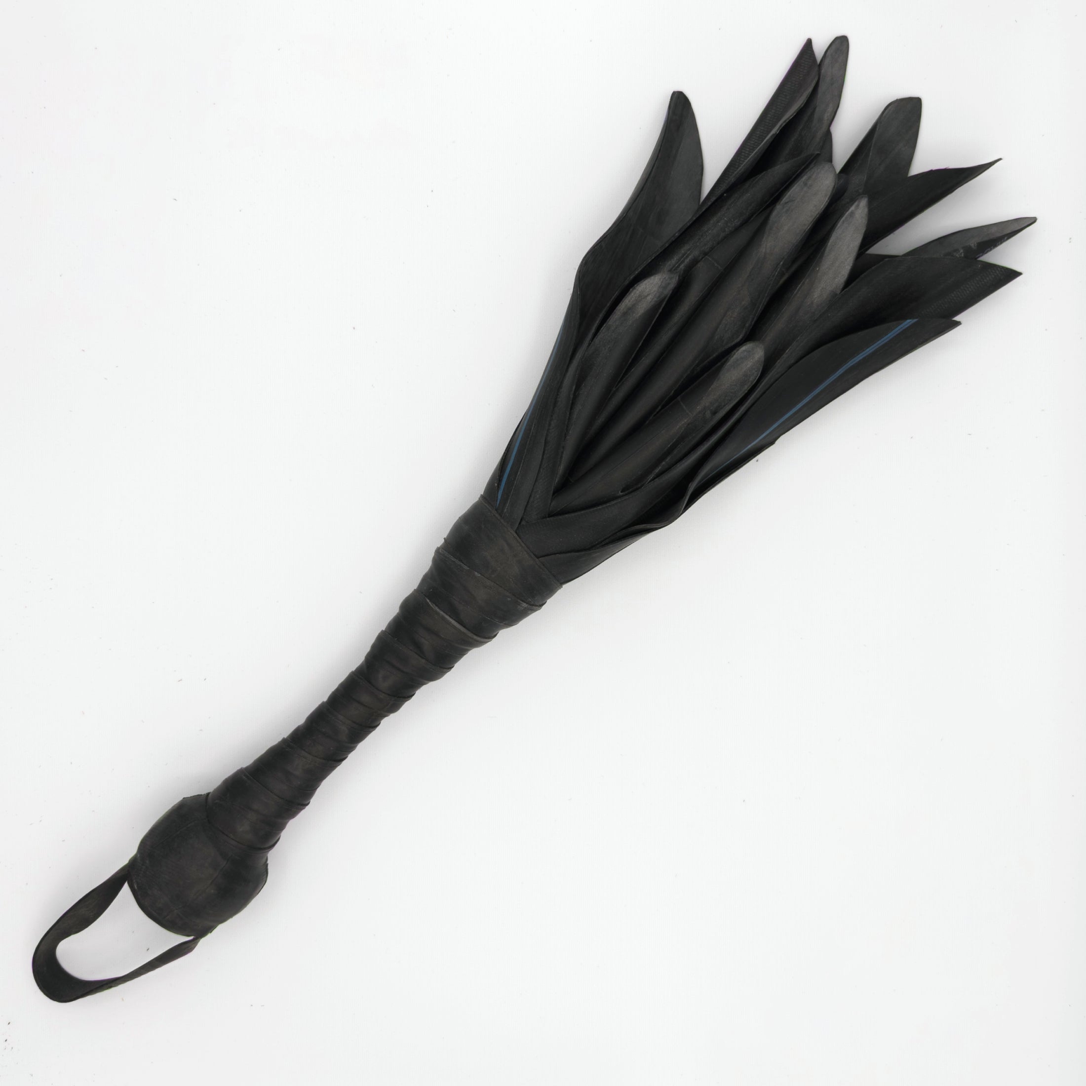 Agreeable Agony Petal Slapper rubber paddle with floral design, medium size leather flower slapper for sensory play.