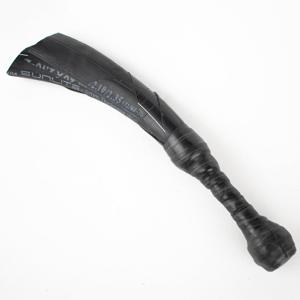 Agreeable Agony Petal Slapper rubber paddle with a floral design, in-stock leather flower-themed spanking implement.