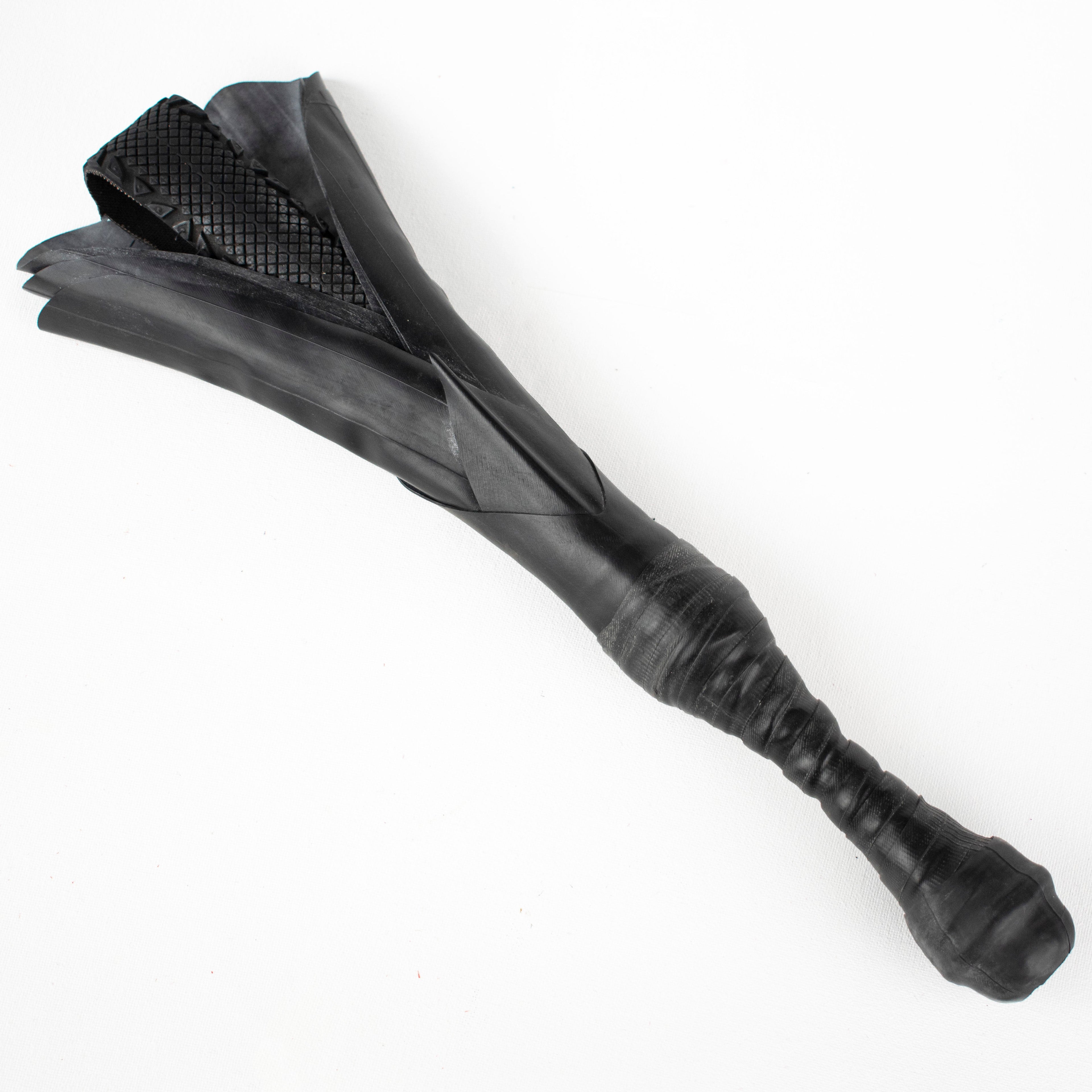 Agreeable Agony Petal Slapper rubber paddle with leather handle, flower design for playful sensation, in stock.