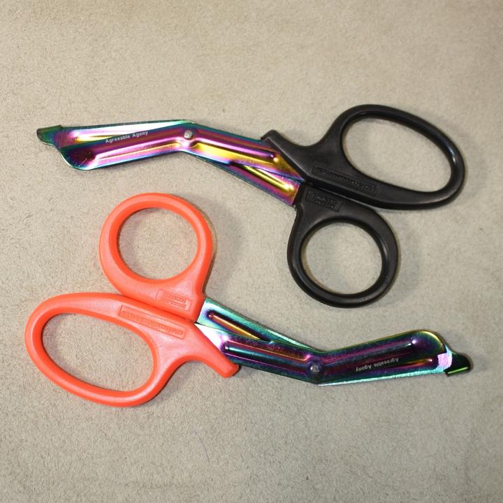 Colorful rainbow-colored 6mm solid braid MFP bondage rope from Agreeable Agony, shown in rainbow steel finish.